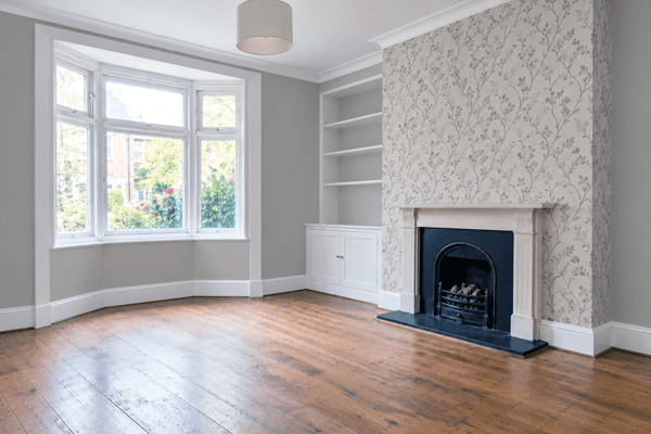 Living room after painting with refreshed walls and trim