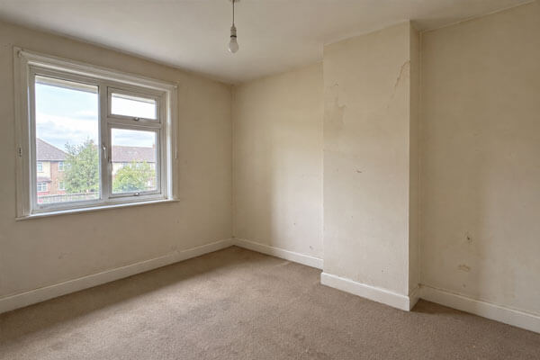 Bedroom walls before repainting